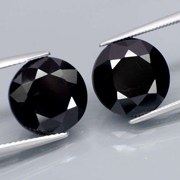 Matched 12.5mm pair of all black Tektite weighing 20.02 carats!