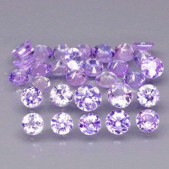 Glittering 3.28ct bright blue violet Tanzanite set