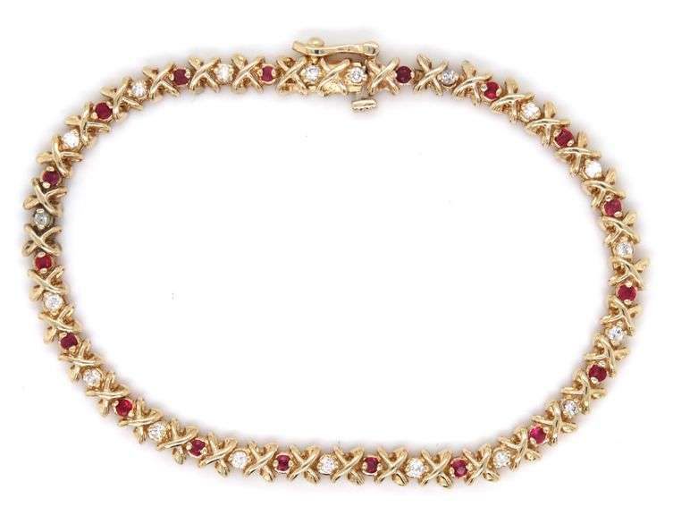 14kt Yellow gold ruby and diamond tennis bracelet