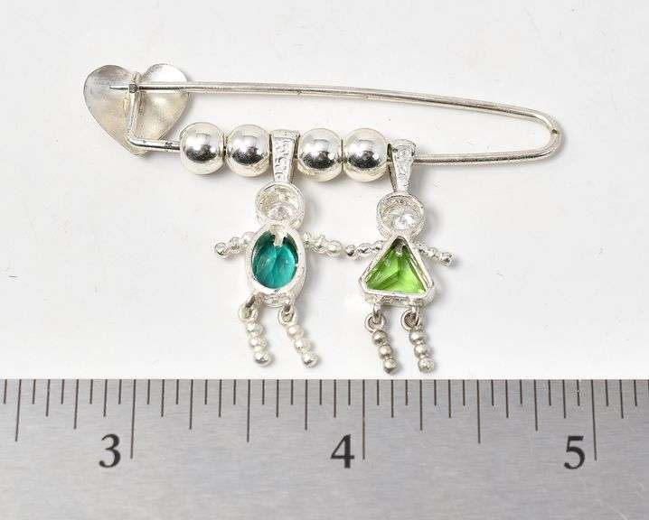 Charm Brooch in Sterling Silver