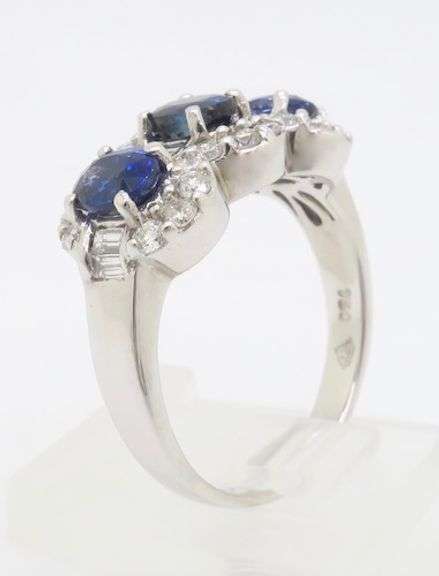 Three Stone Blue Sapphire & Diamond Halo Ring in 18k White Gold