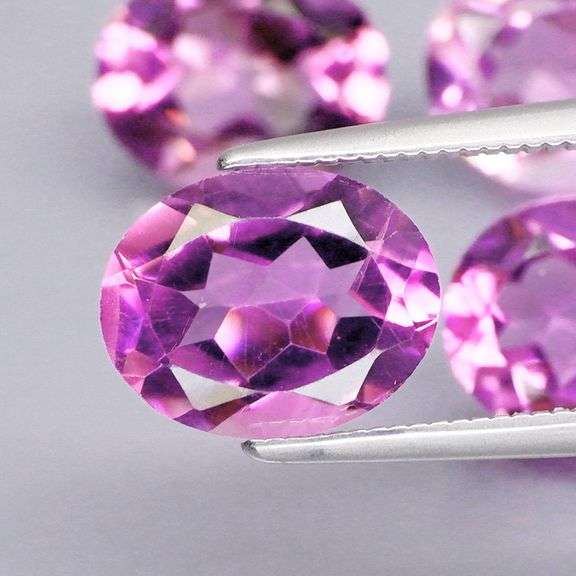 Glittering 8.20ct oval cut Bolivian Amethyst set