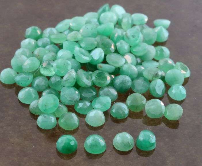 Huge! 31.10ct set of round cut Zambian Emeralds!
