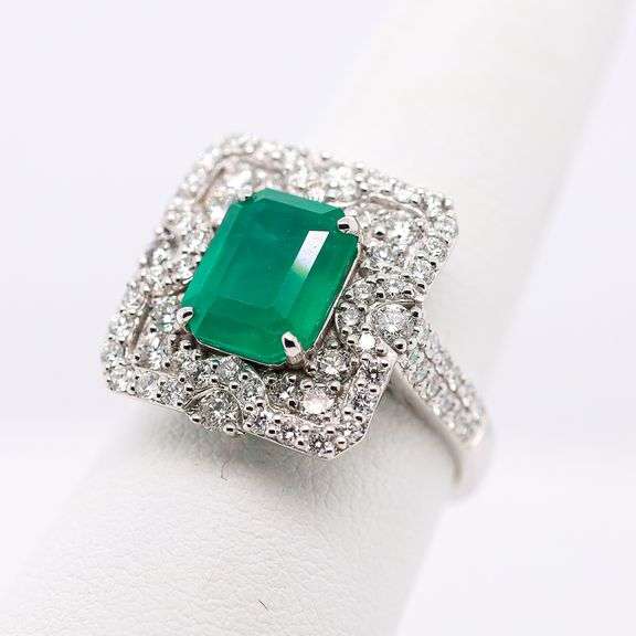 A gorgeous GIA certified 2.96ct.  Emerald and Diamond Ring