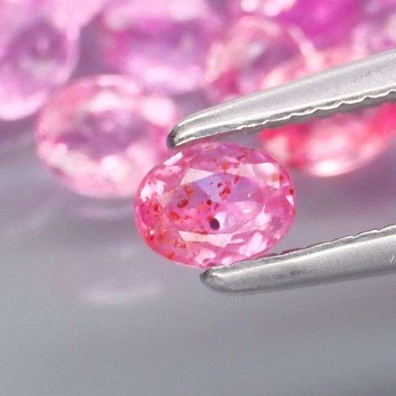 Heated only! Vibrant 4.97ct bubble gum pink Sapphire set