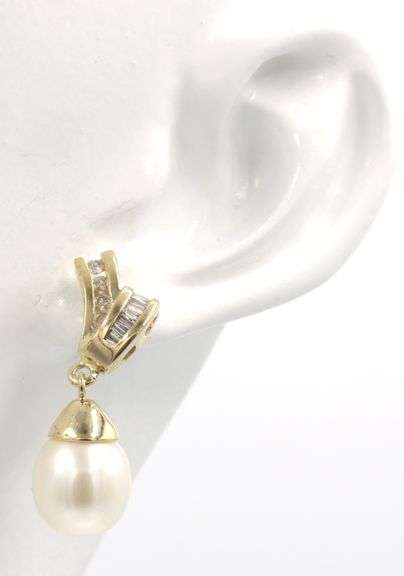 14kt Yellow gold tear drop pearl and diamond dangle earrings