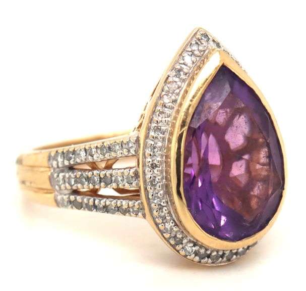 14kt Yellow gold pear amethyst and diamond halo ring