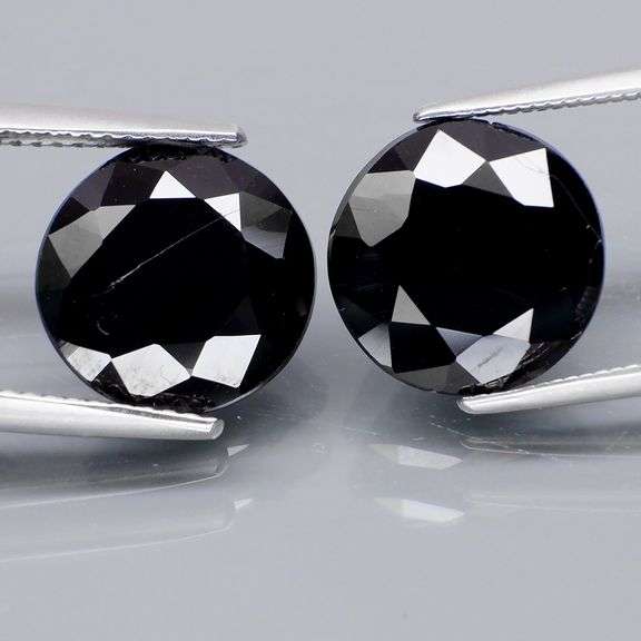 Matched 12mm pair of all black Tektite weighing 13.71 carats!