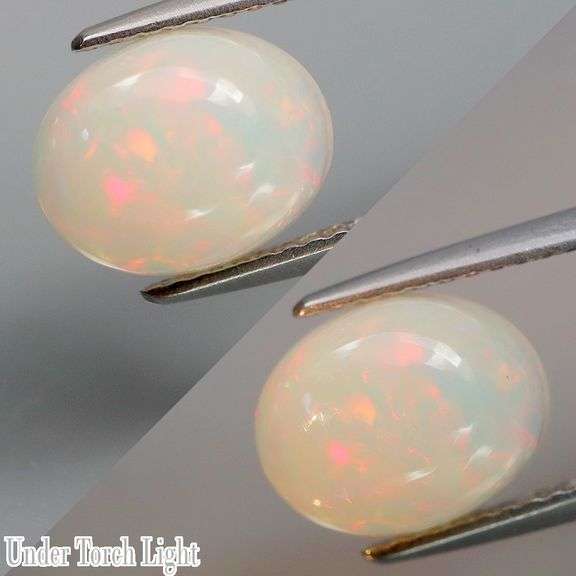 Snow white and filled with colorful light 2.36ct Opal!