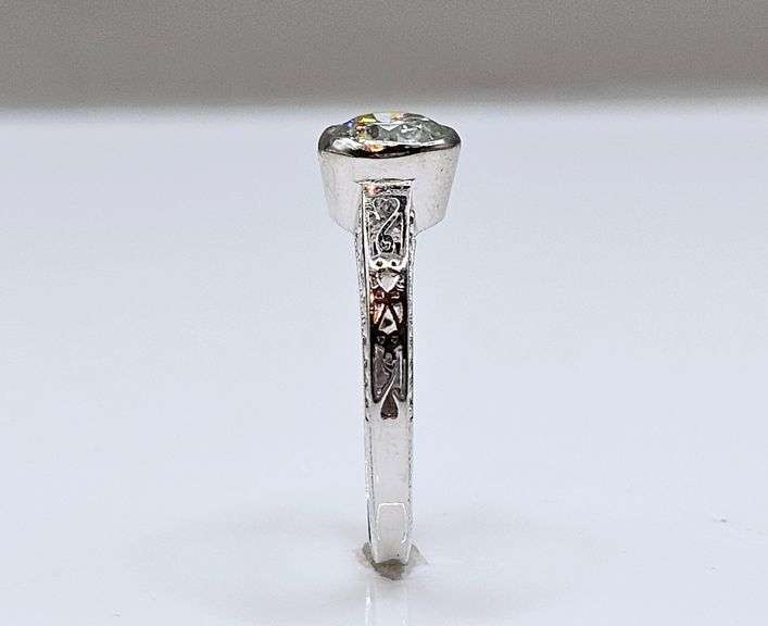 Sparkling 14 Kt White Gold Plated 1.5 Ct Lab Simulated Diamond Ring.