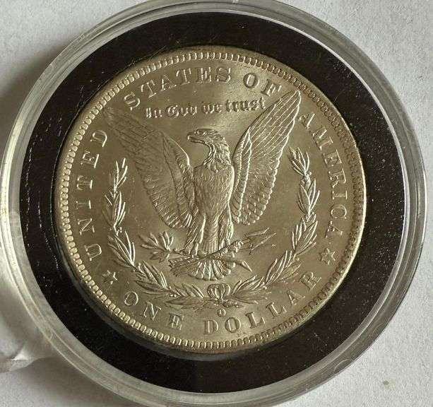 Frosty White BU 1884 O Morgan Dollar.