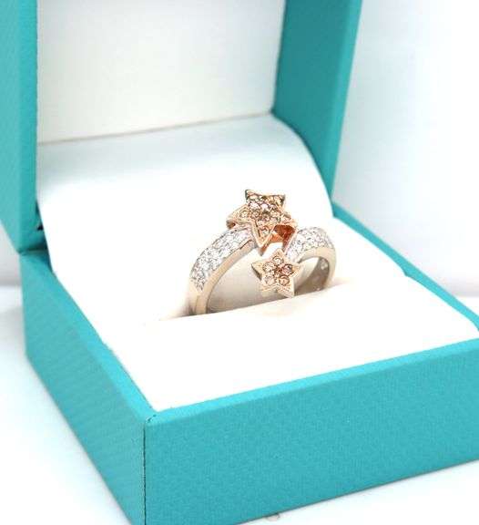 14kt White gold 0.75ctw champagne and white diamond star wrap ring