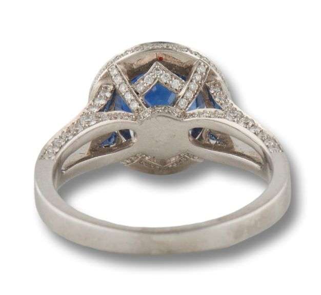 18kt WG Round Cut Blue Sapphire and Diamond Split Shank Halo Ring