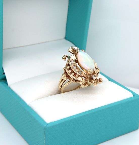 Vintage style opal and diamond ring in 10kt