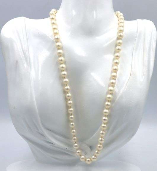 White fresh water pearl necklace with gold clasp