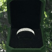 Dazzling White Gold Princess Cut Channel Set Diamond Band