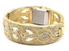 Isacc Mizrahi gold tone and Rhinestone hinged bangle bracelet watch