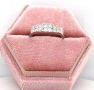 14kt White gold 0.50ctw round brilliant cut and baguette band