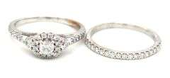 14kt White gold 0.25ct Center diamond in 0.50ctw diamond halo bridal set