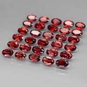 Amazing 8.67ct oval cut red Garnet set