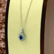 Divine White Gold oval Blue Sapphire and Diamond accent Pendant on Chain Necklace