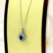 Divine White Gold oval Blue Sapphire and Diamond accent Pendant on Chain Necklace