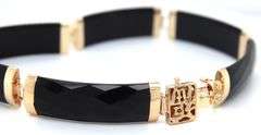 14kt Yellow gold Faceted black onyx link bracelet