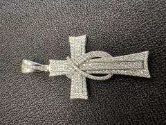 Rhodium Plated 925 Sterling Silver CZ Ribbon Cross Pendant