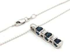 14kt White gold 0.90ctw sapphire and baguette diamond pendant on chain