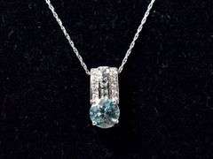 Lovely Blue Topaz Pendant Necklace in 10K Yellow Gold