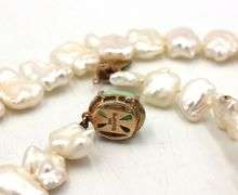 Creamy pearl strand necklace with Jade clasp