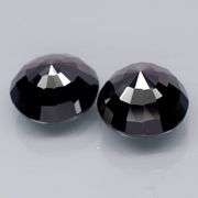 Matched 12.5mm pair of all black Tektite weighing 20.02 carats!