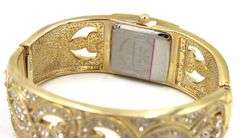 Isacc Mizrahi gold tone and Rhinestone hinged bangle bracelet watch
