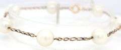 14kt Yellow gold white fresh water pearl bracelet