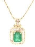 14kt Yellow gold emerald cut emerald in diamond halo pendant on chain