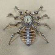 etal Spider Clock Sculpture