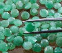 Huge! 31.10ct set of round cut Zambian Emeralds!