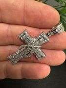 Rhodium Plated 925 Sterling Silver CZ Ribbon Cross Pendant