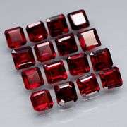 Impressive! 7.67ct emerald cut cherry red Garnet set!