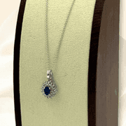 Divine White Gold oval Blue Sapphire and Diamond accent Pendant on Chain Necklace