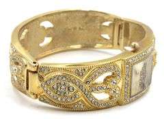 Isacc Mizrahi gold tone and Rhinestone hinged bangle bracelet watch