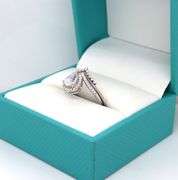 14kt White gold synthetic moon stone and CZ halo bridal set