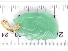 Green Jade fish head pendant in 14kt yellow gold