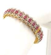 Enamoring 10.58CTW Oval Shaped Emerald-Cut Rubies & 5.04CTW Diamond Bangle Bracelet on  14kt Yellow 