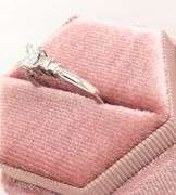 14kt White gold approximate 0.75ctw Radiant diamond with 0.25ctw Princess cut diamond ring
