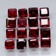 Impressive! 7.67ct emerald cut cherry red Garnet set!
