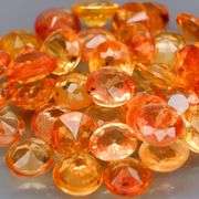 Full fire! 4.85ct top orange Sapphire set