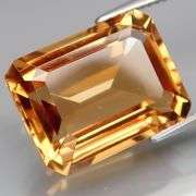 Impressive flashing in this 11.85ct emerald cut Citrine!
