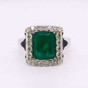 Elegant 18K GIA certified 4.22 ct. Emerald and Diamond Ring