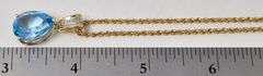 Mesmerizing Topaz Pendant Necklace in 14K Yellow Gold